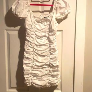adorable BNWOT white mini dress in white linen material Size xs Pristine zip up